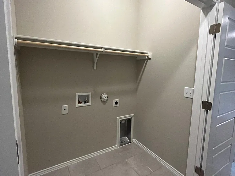 Convenient laundry room in hallway. This photo was taken before Washer and Dryer were installed. Washer and Dryer included.