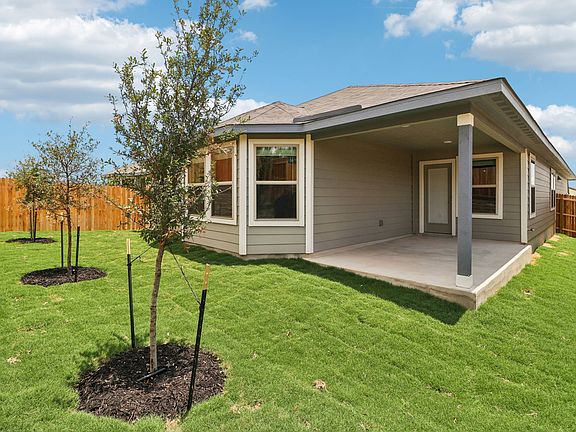 Back exterior of the Hughes floorplan at a Meritage Homes community.