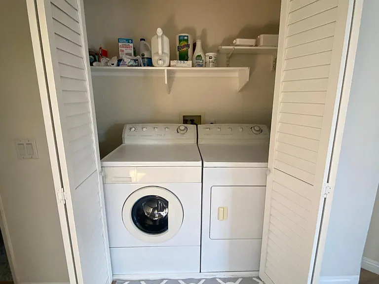 Full size front loading washer and dryer in unit