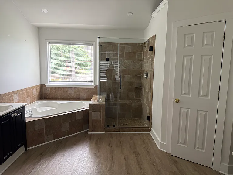 Master bathroom w/2 separate counter tops with sinks.