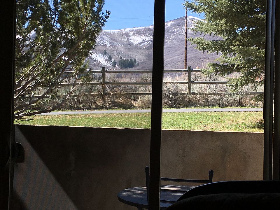 View from the Living room looking at the Millennium Trail and open space behind.