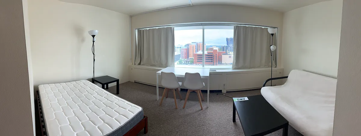 Photo 2 of 10 - 555 E William St #12E - Ann Arbor, MI Panoramic with full living and sleeping space. Use a screen to turn a studio into a one bedroom! - 555 E William St #12E