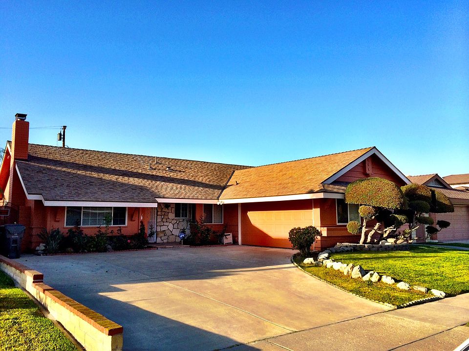 Front of House with Long Driveway