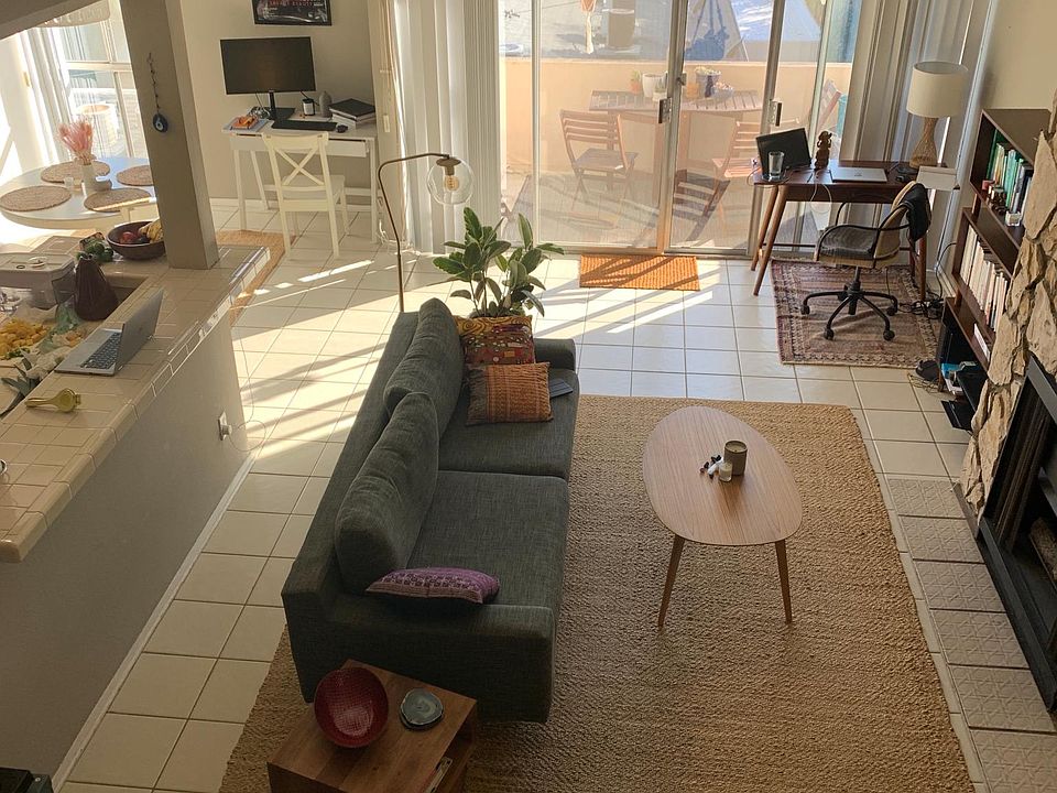 View from stairs overlooking living area.