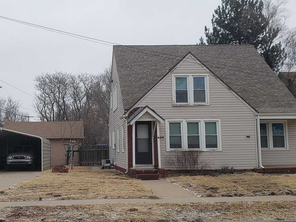 Unit #8 on the right side with the wide covered porch. Half Carport for each unit.