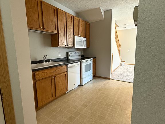 Kitchen looking through to living room