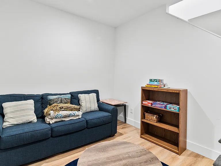 Downstairs "play room" with games and pull out couch