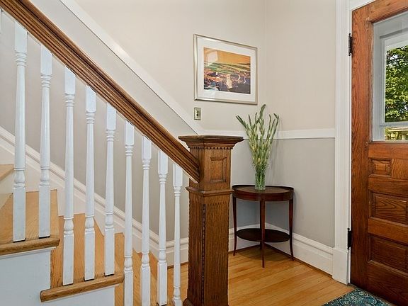 Gorgeous original vintage front door and stairway.