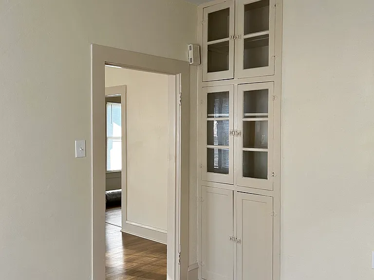 Built in cabinet in dining area.