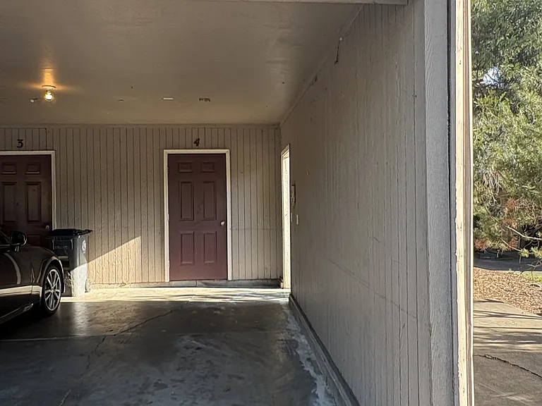 Carport with storage room