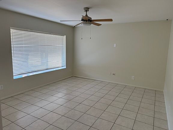 Enter from street to living room. 52" fan to cool large open space.