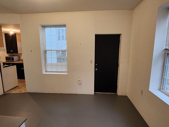 Living room with separate outside entrance