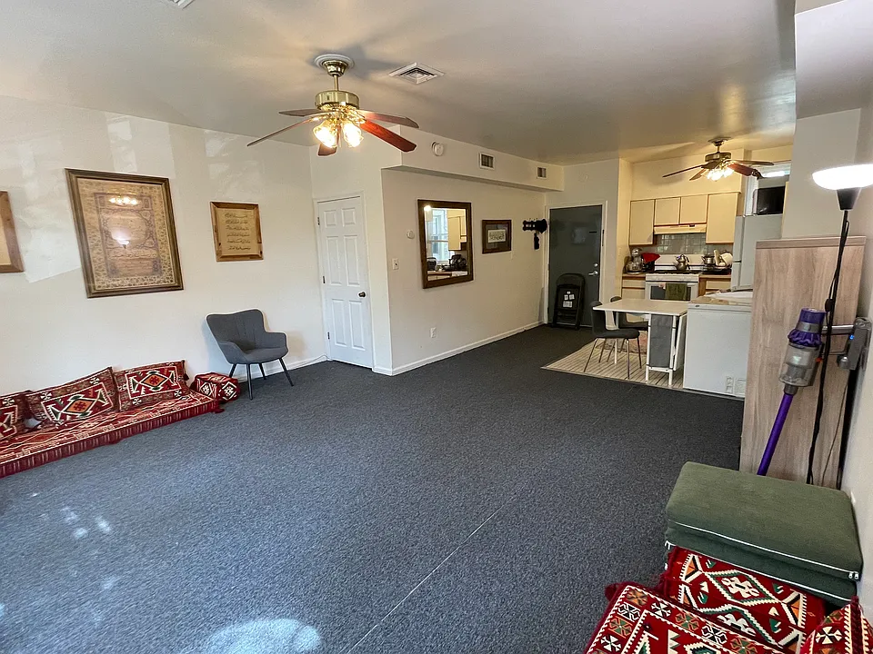 Living Room (door on the left opens to upstairs)