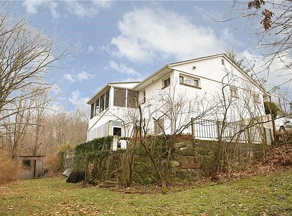 Sideview of the house from the backyard