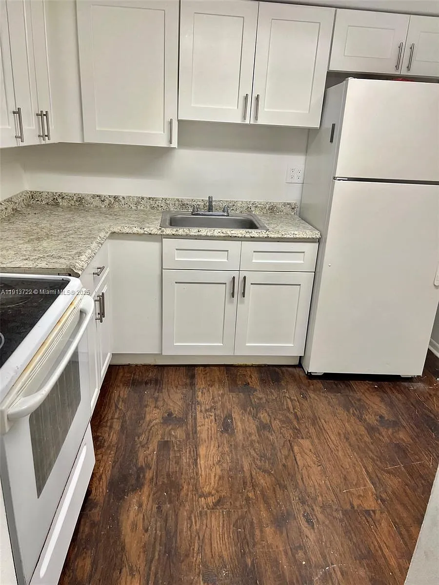 Photo 2 of 7 - 1752 NW 55th Ave #102 - Lauderhill, FL Building Photo - 1752 NW 55th Ave #102