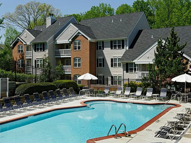 Swimming pool and sundeck with lounge seating