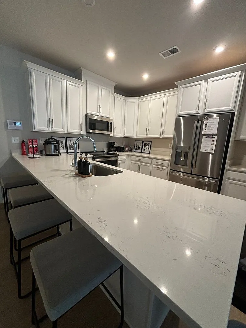Modern 3BR Condo: Walk to Metro, 3 Miles from IAD — Photo 1