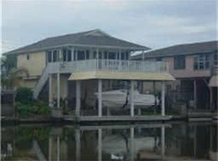 1734 Tiki Dr, Tiki Island, TX 77554