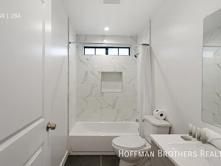 7441 Hazeltine Ave #104 — Photo 21