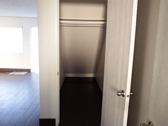 Coat closet with storage.
