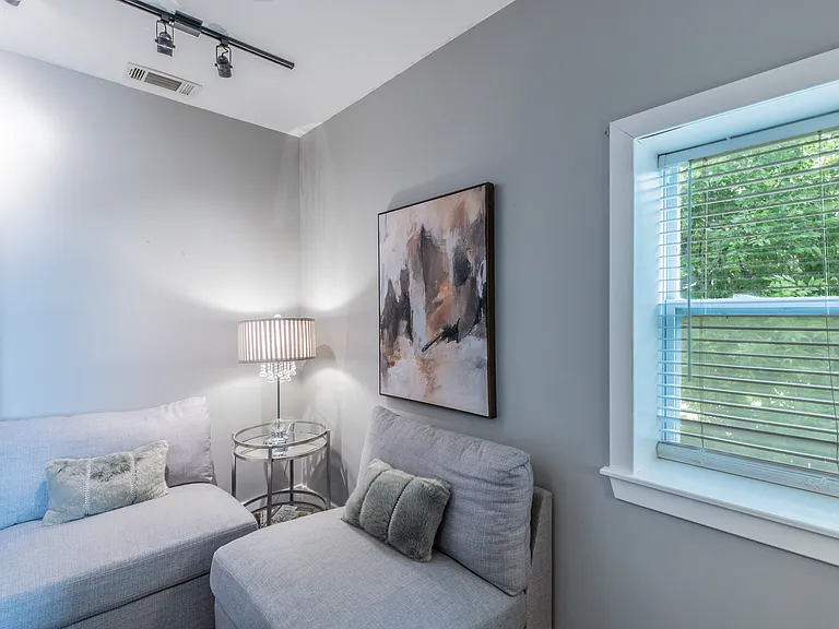 A sun-drenched corner perfect for reading or morning coffee.