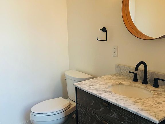 Powder room off main area.