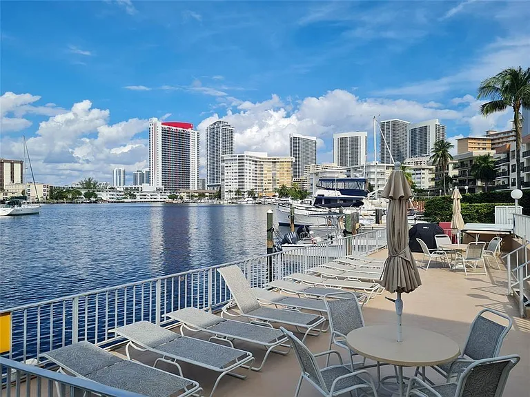 300 Golden Isles Dr #104 — Photo 1