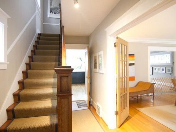 A formal entry with staircase welcomes you and your guests.