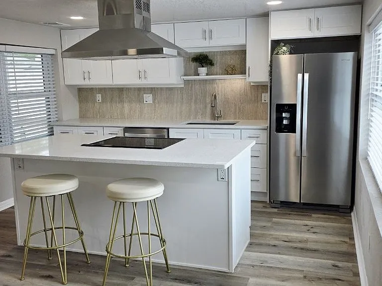 Kitchen with new appliances and new cabinets
