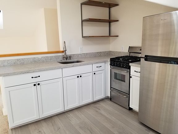 Brand new full kitchen with gas range stove and granite coun