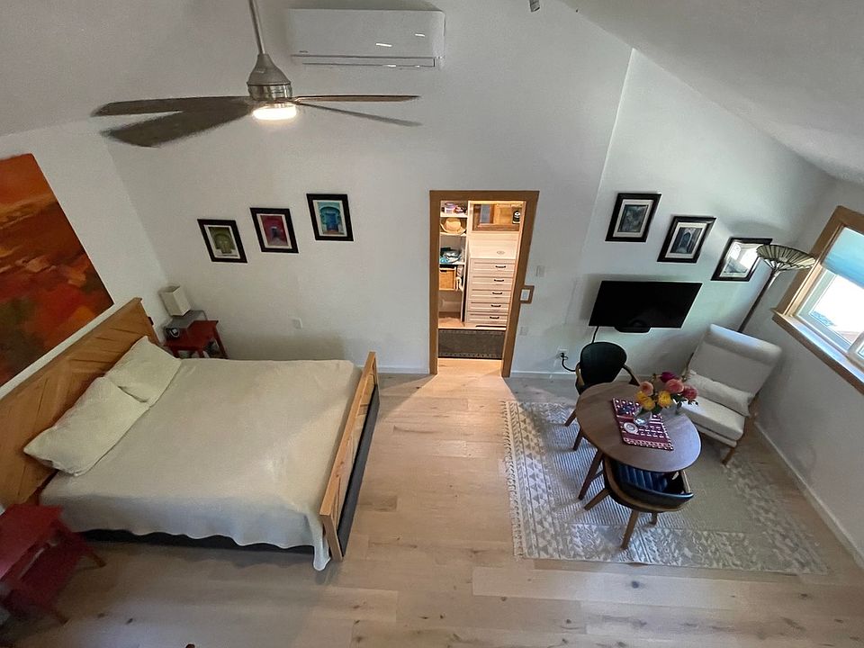 Vaulted ceilings make the studio feel very spacious