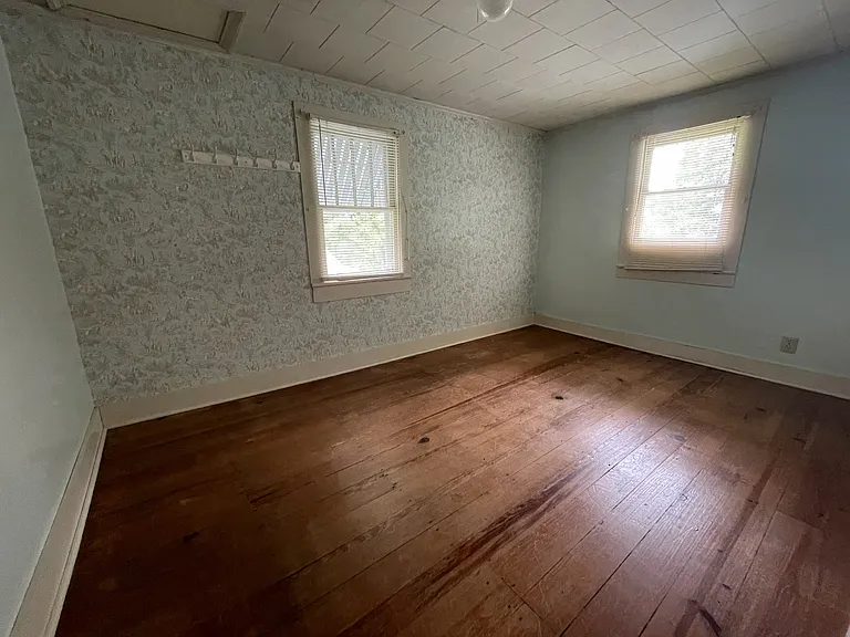Bedroom #3 with broadboard floors