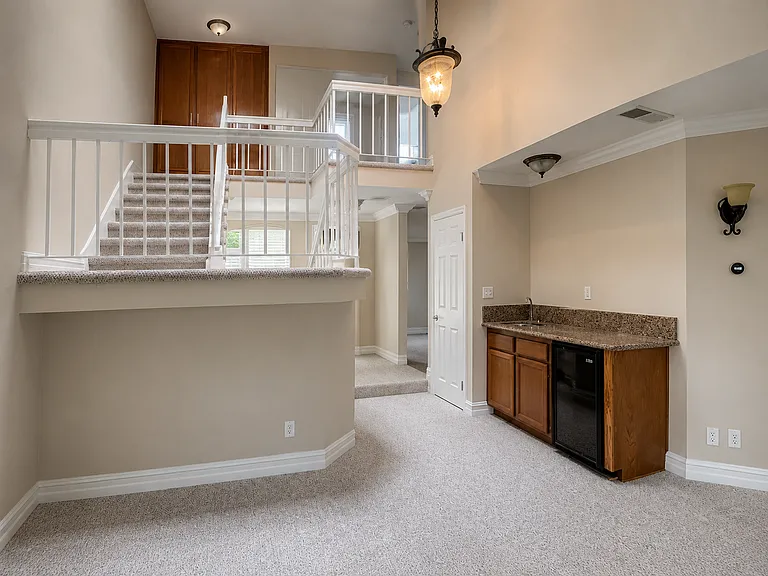 Built in wet bar with storage/coat closet