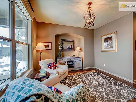 DINNING ROOM OR SITTING ROOM, YOUR CHOICE, WITH LOVELY HARDWOOD FLOORS.