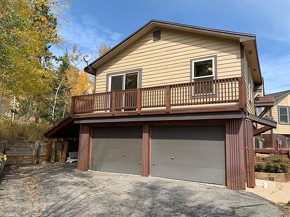 2 Car Garage and one car carport. Additional surface parking in the driveway.