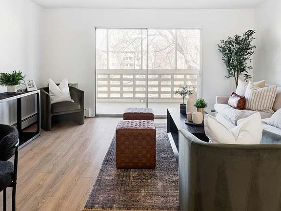 Bright living room opens to patio