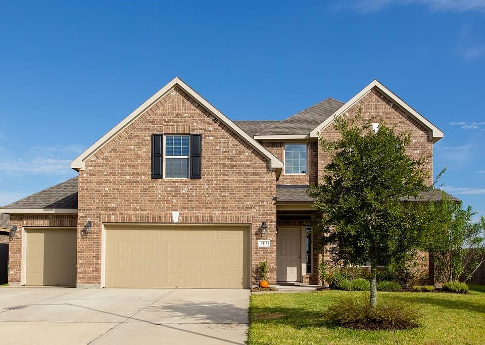 Beautiful Lake Front Home with 3 Car Wide Garage and On a Cul-De-Sac