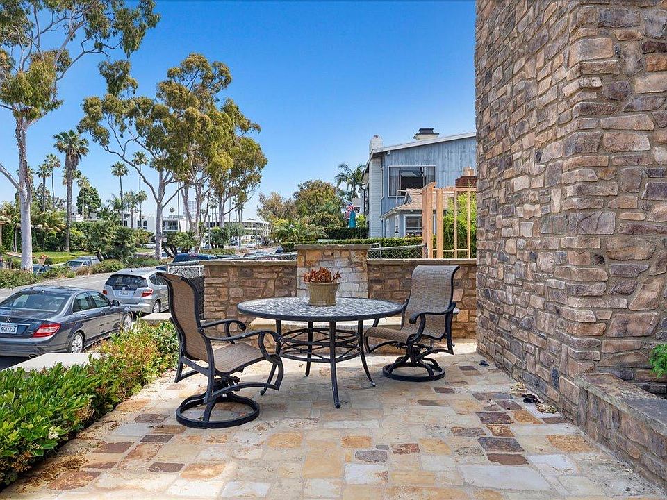 Large stone raised patio front gated