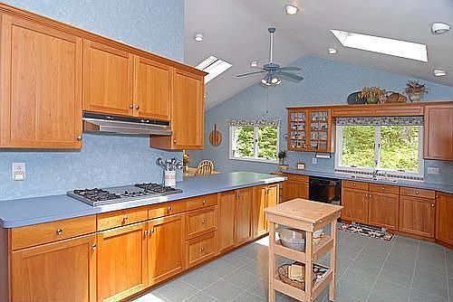 Large kitchen with cathedral ceilings/skylights