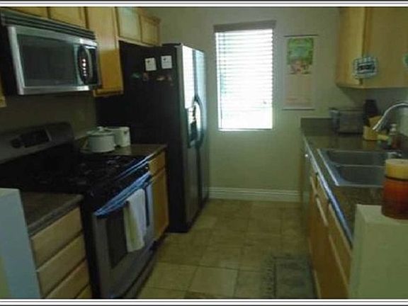 2nd image of 10166 Camino Ruiz Unit 26