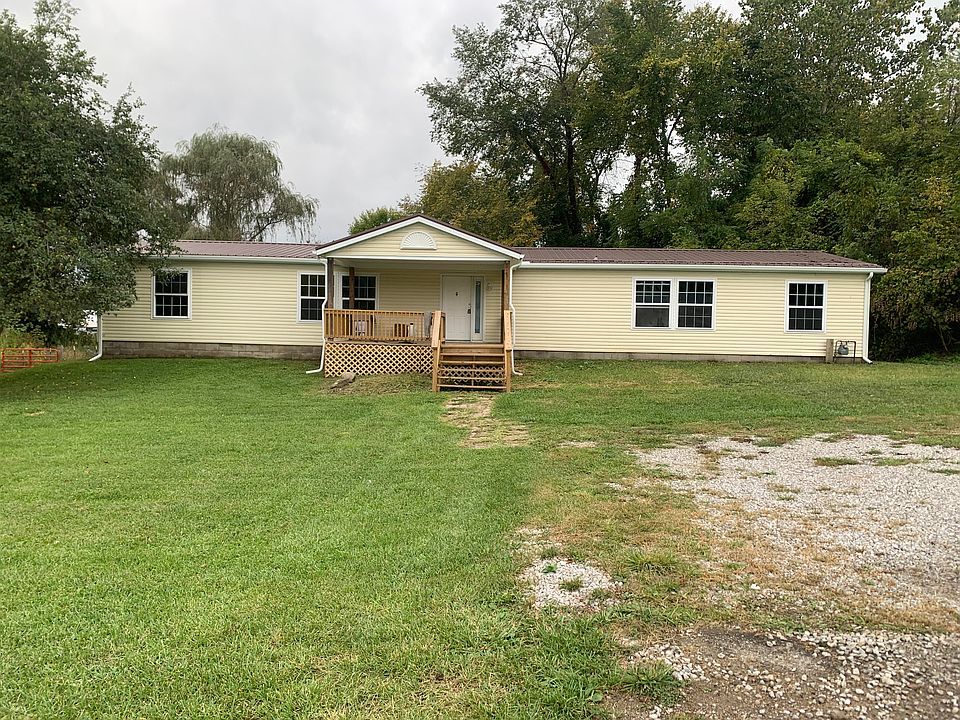 Front of house with new covered deck