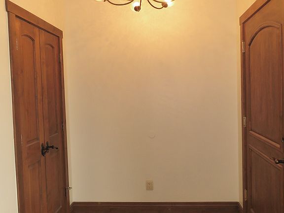 FOYER: STONE FLOOR/BRICK 