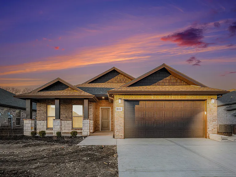 Photos were taken before this new home construction was completed. There is now beautiful sod, a sprinkler system, and landscaping in the front yard