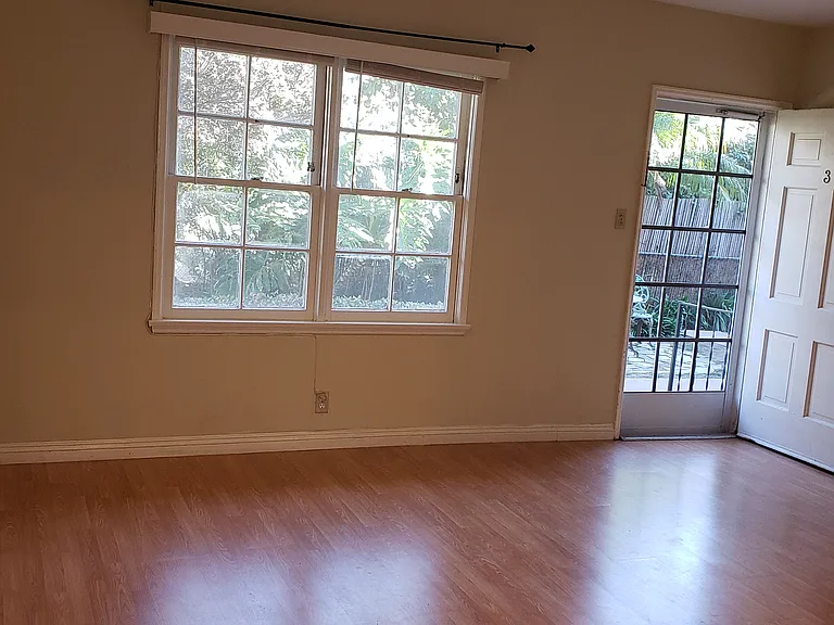 Front door opens to peaceful garden setting