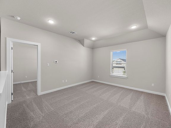 Game Room in the Magnolia home plan by Trophy Signature Homes - REPRESENTATIVE PHOTO