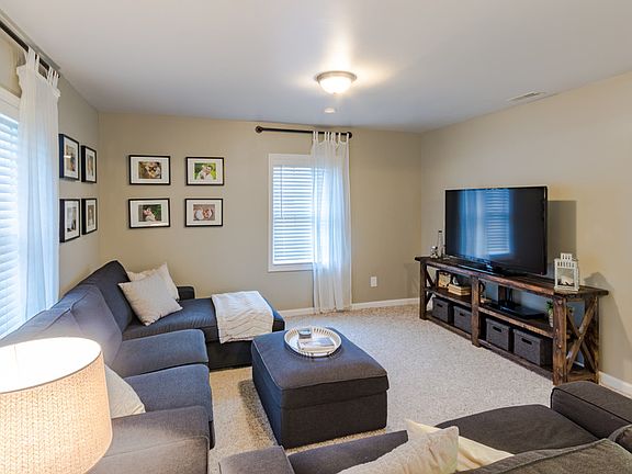 This view of the living room shows just how spacious it is.  Also the main floor bedroom is right off the living room.  Great office or guest room.
