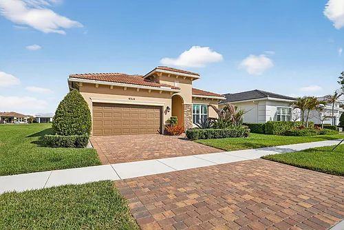 9318 SW Miracoli Way Photo 1