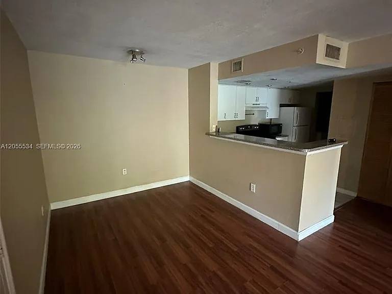 5035 Wiles Rd #203 — Photo 4