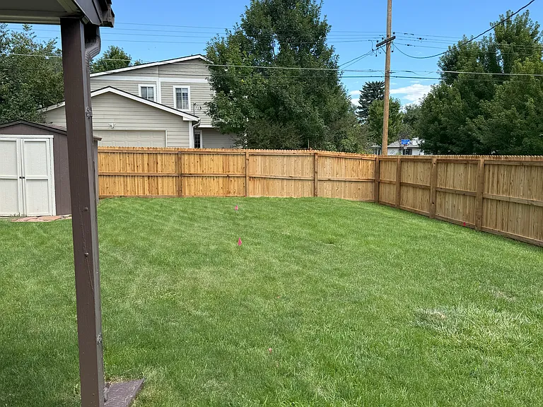 Fenced backyard with brand new privacy fence. Lawn care included.
