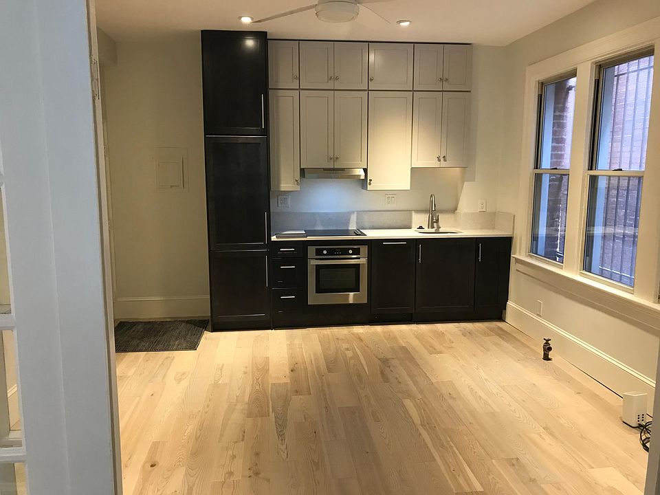 Newly renovated galley kitchen has Bosch appliances, plenty of storage.